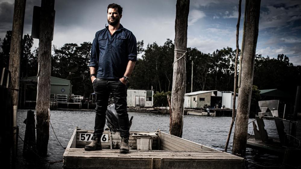 Batemans Bay oyster farmer Ewan McCash stands on the Clyde River. Photo: Paul Jones