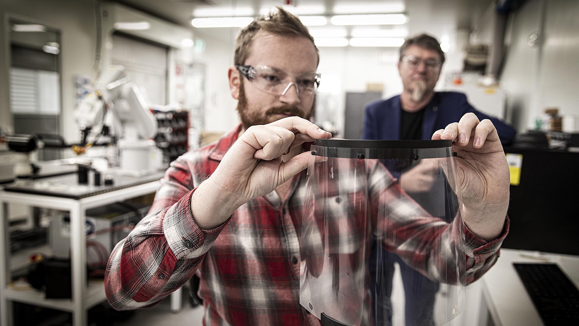 Distinguished Professor Gordon Wallace and additive fabrication technician Cameron Angus at the University of Wollongong’s Translational Research Initiative for Cell Engineering and Printing (TRICEP) facility.