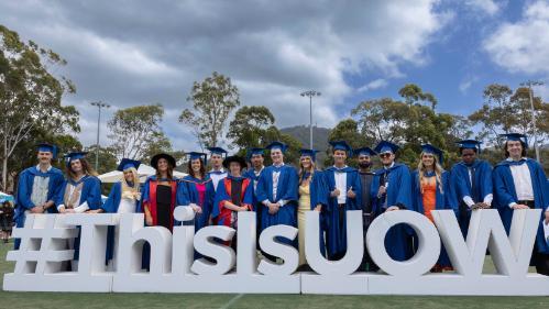 UOW graduates in gowns and mortarboards at the November 2023 graduation ceremonies. Photo by Mark Newsham
