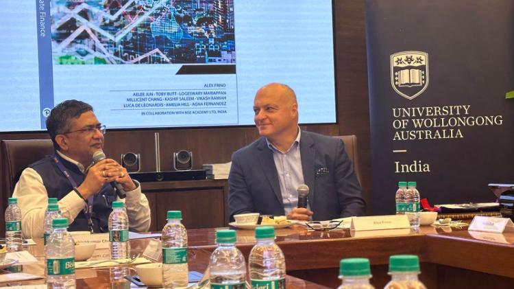 UOW Senior Deputy Vice-Chancellor and Vice-President, Professor Alex Frino and NSE CEO Shri. Ashishkumar Chauhan at the book launch