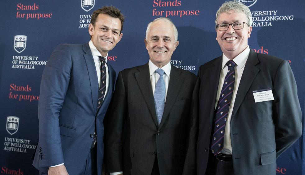 Former Australian Test cricketer and UOW Ambassador Adam Gilchrist, with former Prime Minister Malcolm Turnbull and Professor Paul Wellings at the announcement of Molecular Horizons in Canberra in 2016. Photo: Paul Jones