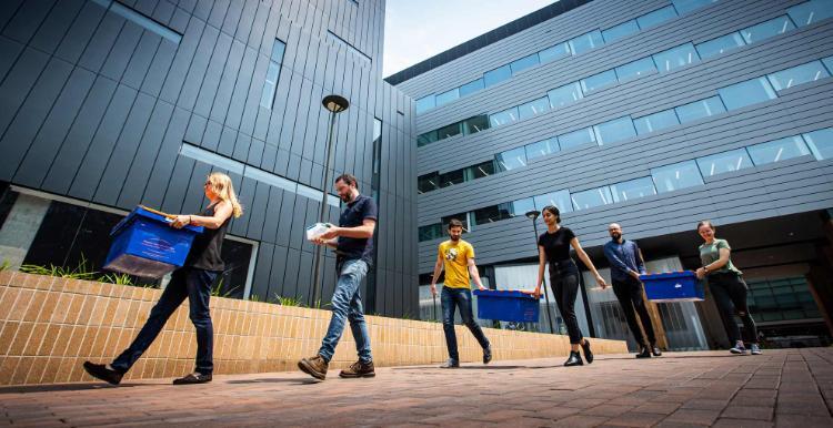 The Molecular Horizons research team move in to their new building. Photo: Paul Jones