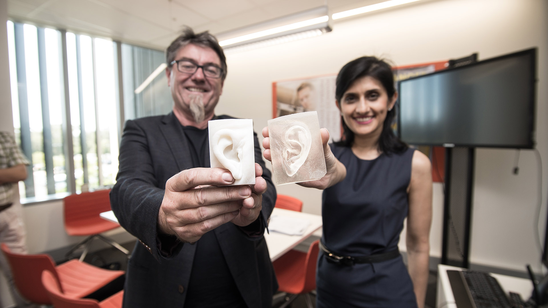 Professor Gordon Wallace and Associate Professor Payal Mukherjee with samples of 3D bioprinted artificial ears