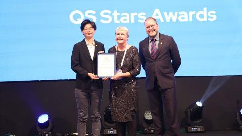 UOW Dean of Business Professor Grace McCarthy accepts UOW's QS Stars Award QS Stars Award at the QS Higher Education Summit: Asia Pacific in Kuala Lumpur, Malaysia. of the University