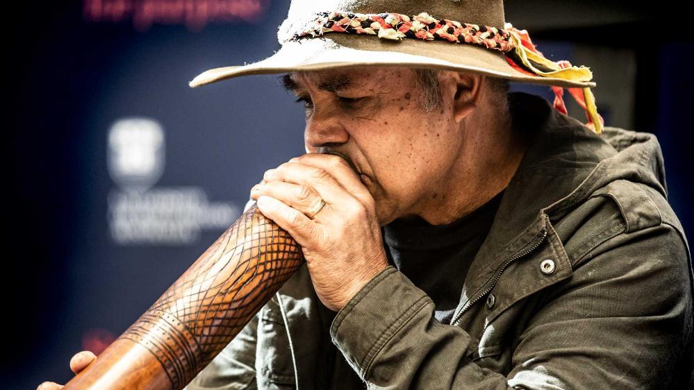 An Indigenous didgeridoo player at the Reconciliation Action Plan launch at UOW. 