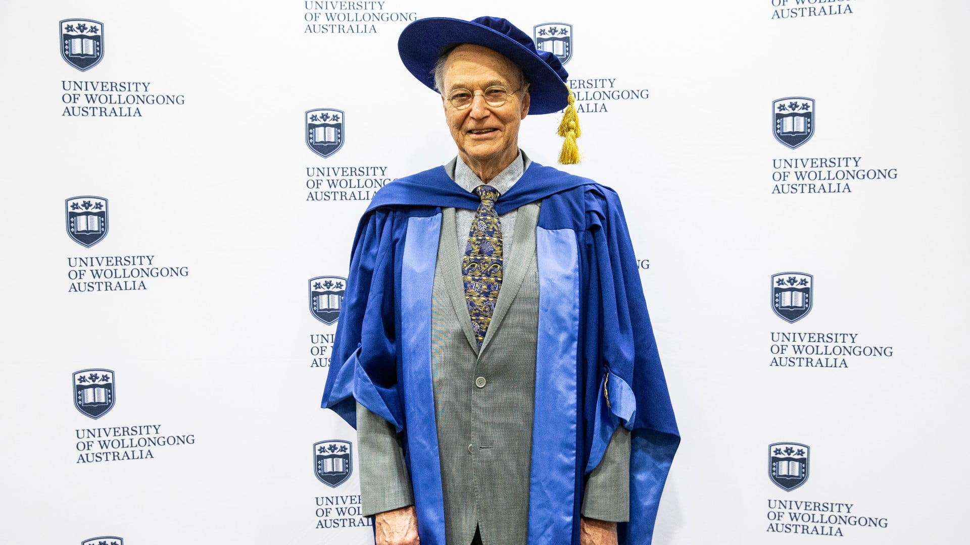 Emeritus Professor Richard Kenchington, pictured wearing his graduation gown and cap. Photo: Paul Jones