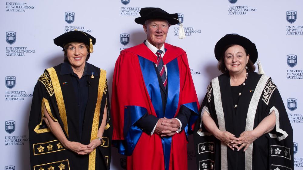 Dr Robert Moses, centre, with UOW Chancellor Christine McLoughlin and Vice-Chancellor Professor Patricia M Davidson. Photo: Andy Zakeli
