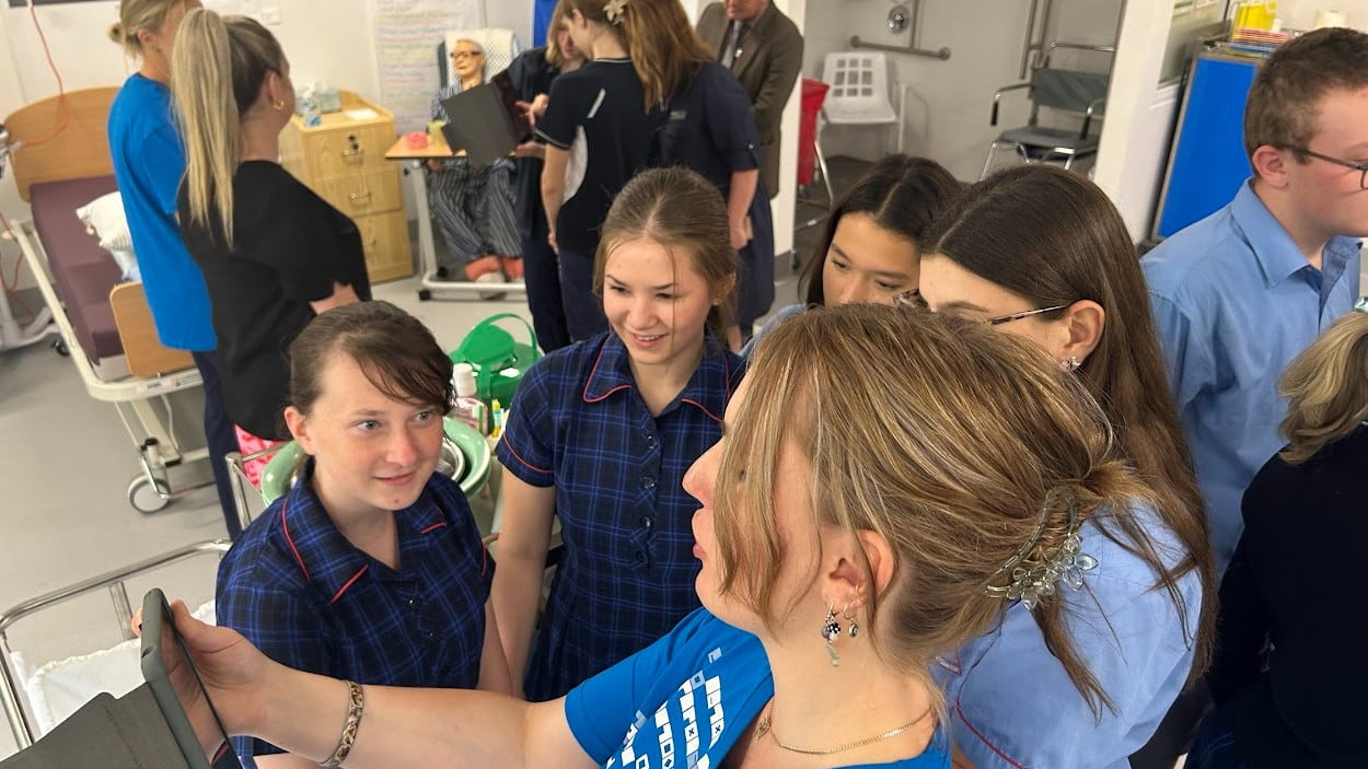 Students from Moss Vale High School look at an iPad in a nursing lab. Photo: Supplied