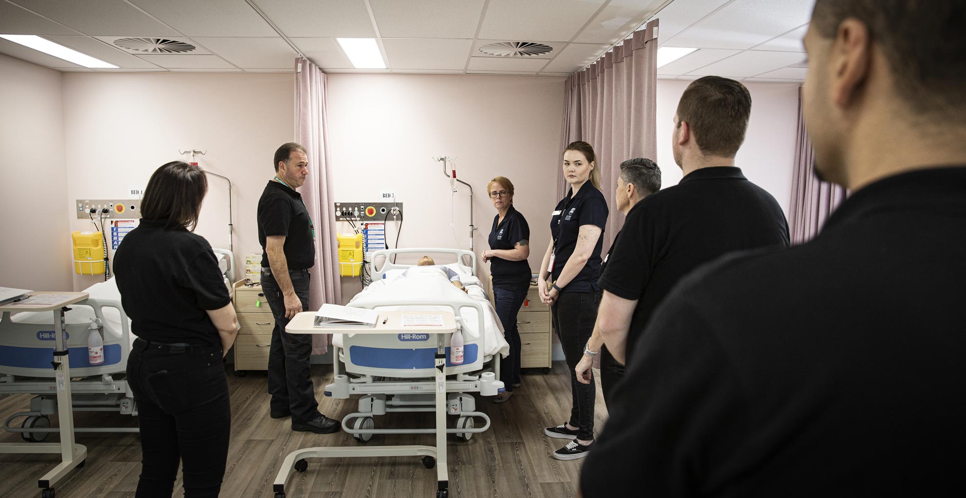BAMS employees take part in infection control training at UOW's South Western Sydney Campus. Photo: Paul Jones