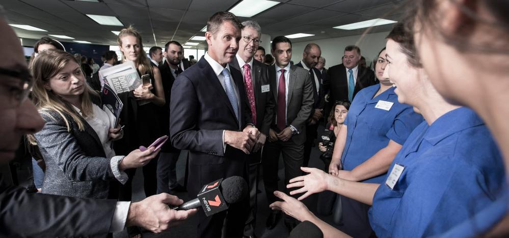 Professor Paul Wellings with former NSW Premier Mike Baird at the announcement of UOW South Western Sydney in Liverpool in 2016. Photo: Paul Jones