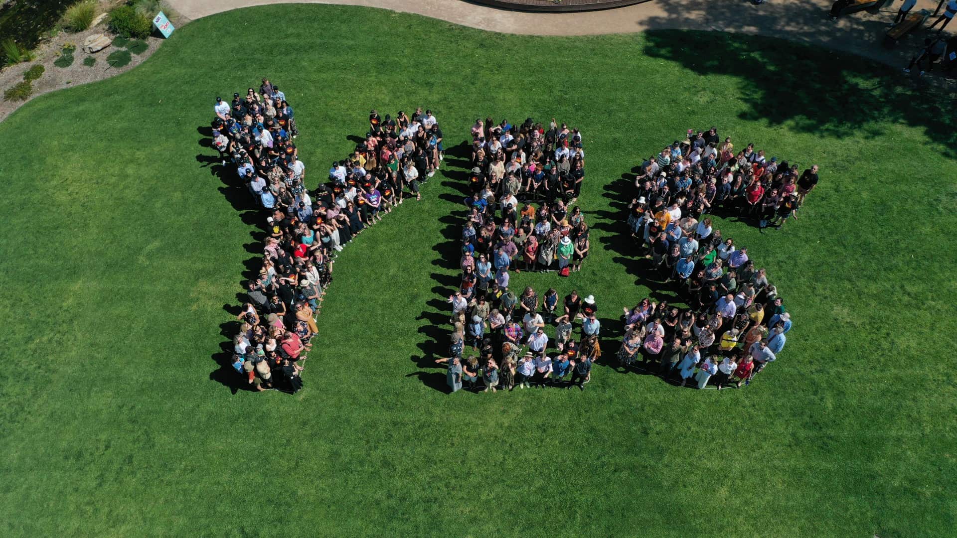 Hundreds of UOW staff form a giant Yes on the lawns of Wollongong campus. Photo: Tad Souden
