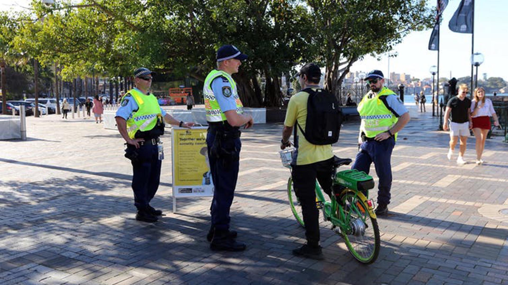 NSW Police photo of policemen talking to a cyclist