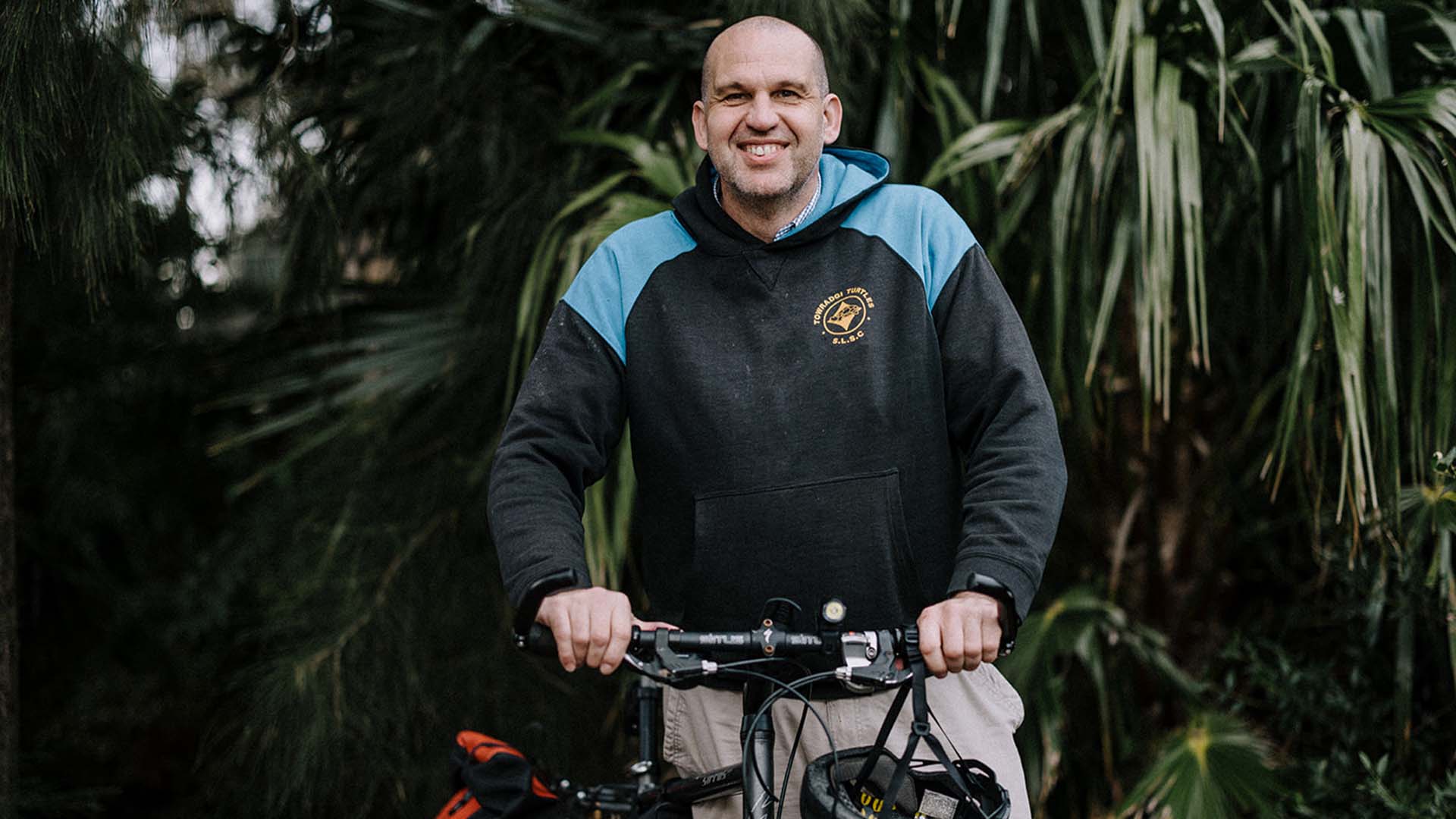 Professor Aidan Sims on his bike