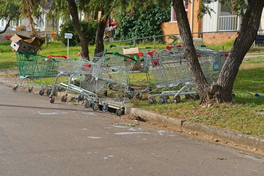 multiple trolleys scattered on the road