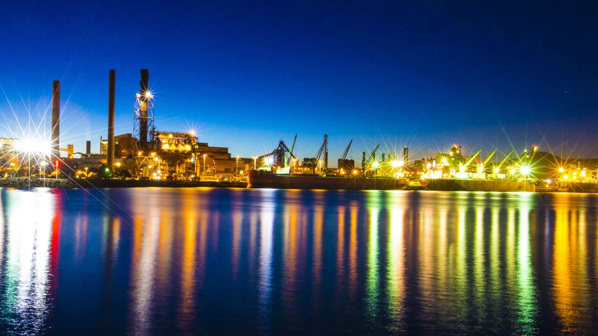 The Port Kembla Steelworks at night from the water