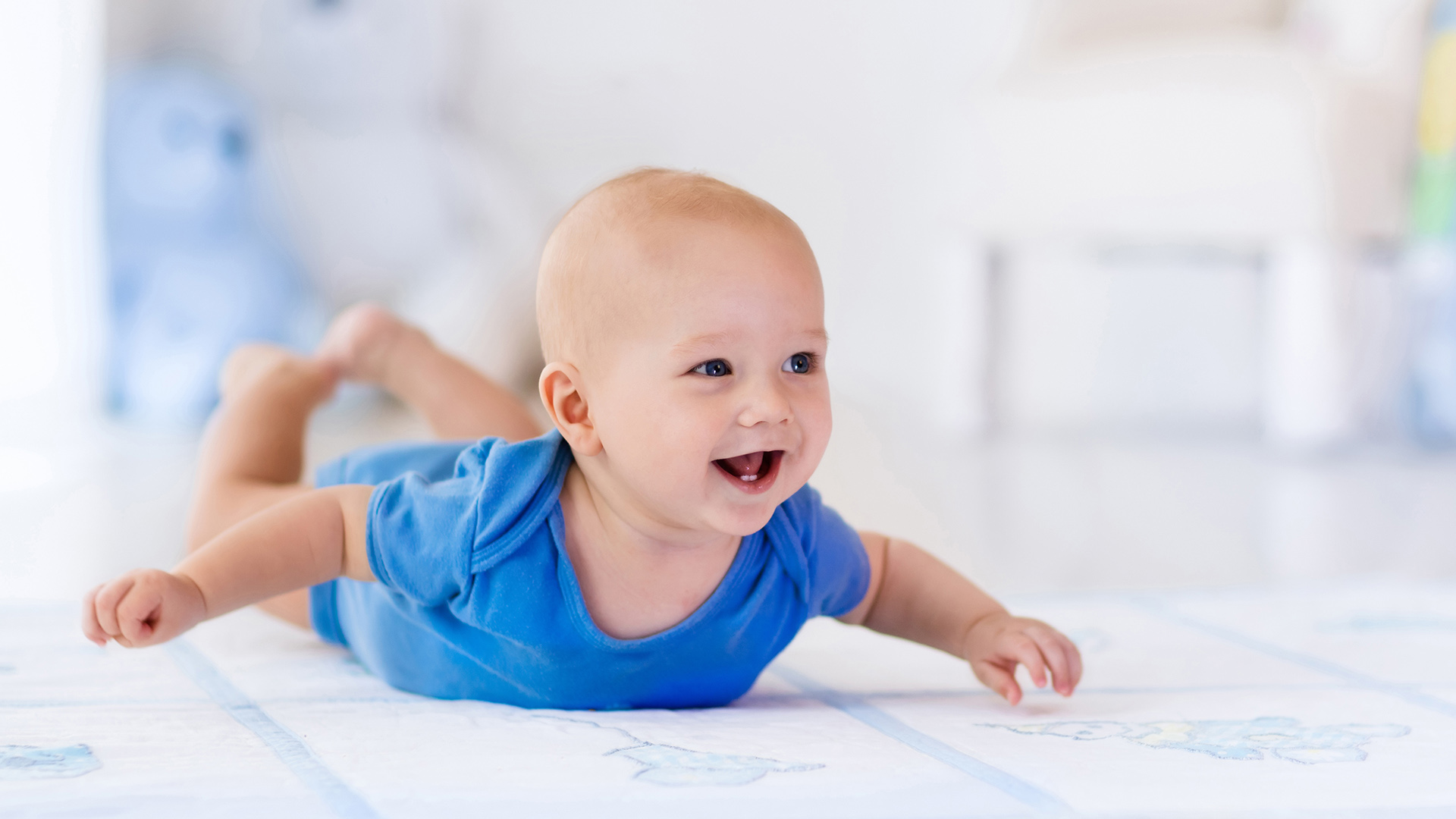 A baby playing on its stomach. Generic photo from Shutterstock