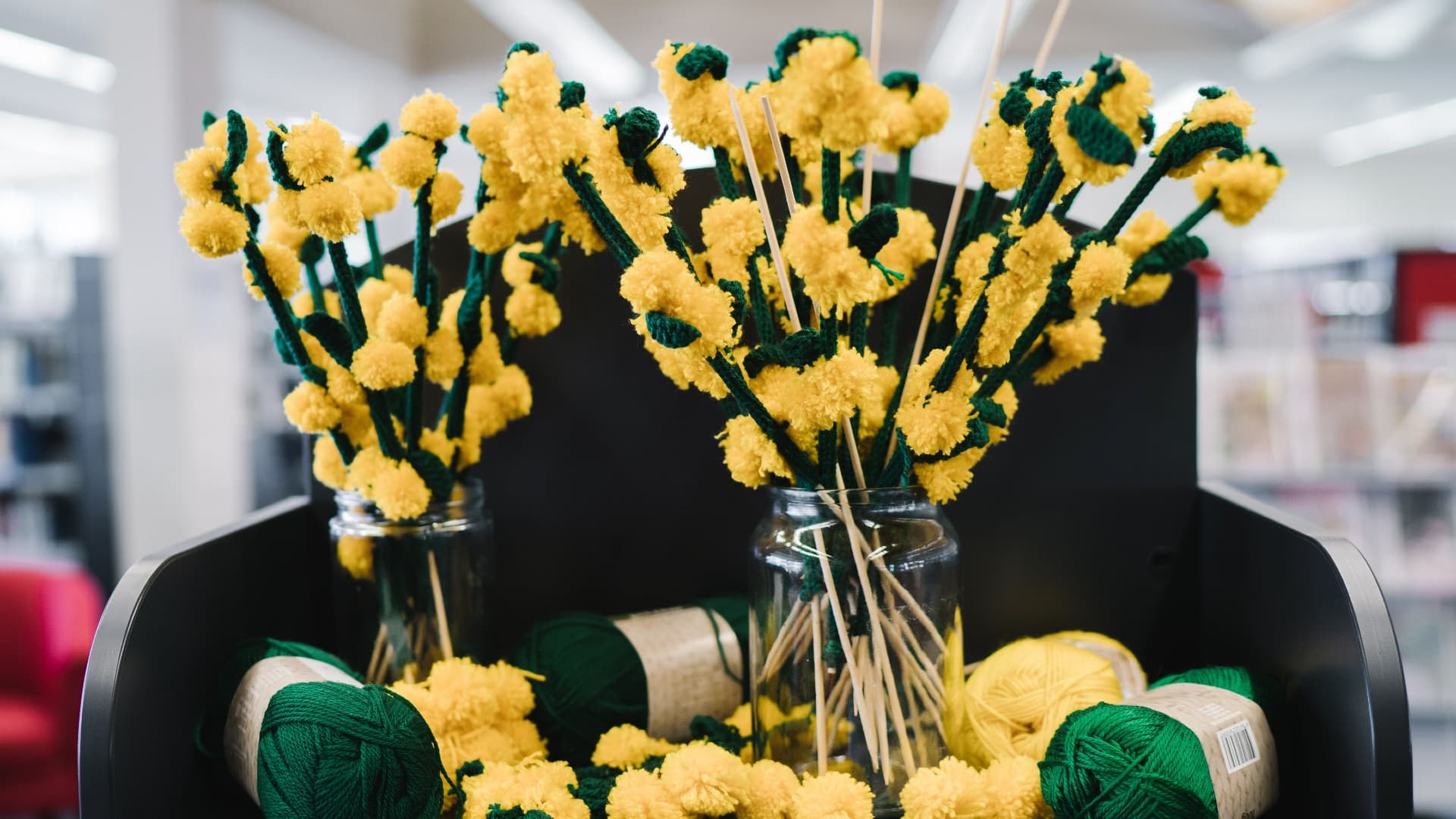 The knitted wattle flowers that will be created as part of the Wattle Walk. Photo: Sunbird Photography