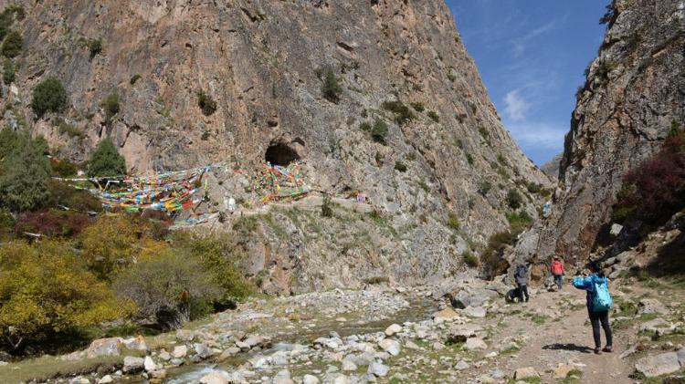 the entrance to Baishiya Karst Cave in Tibet