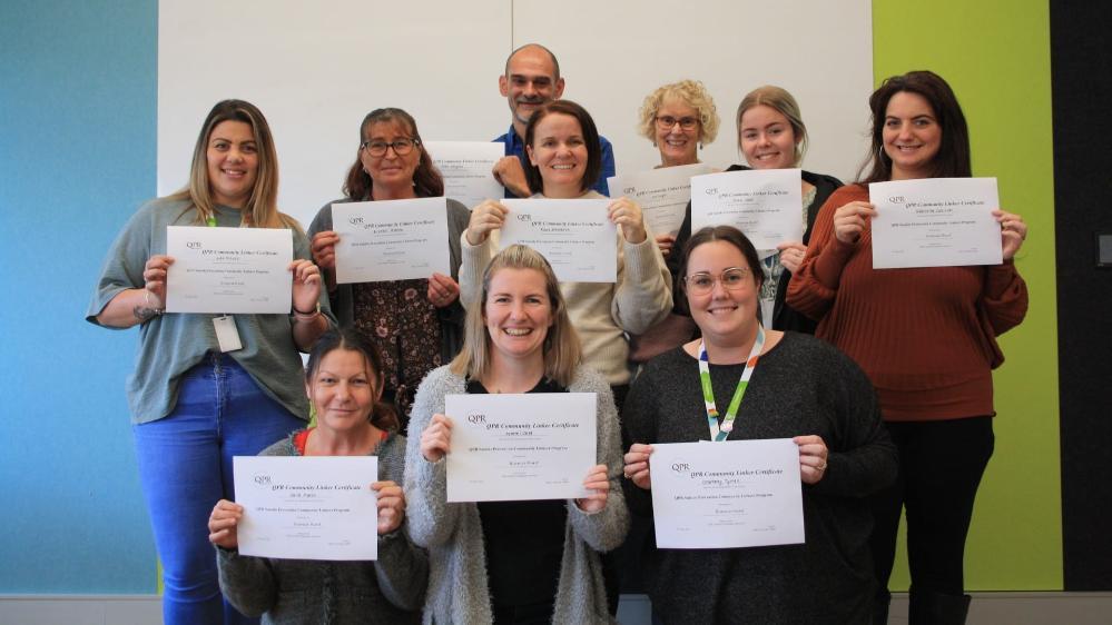 Participants of the Community Linkers training display their certificates. Photo: Submitted