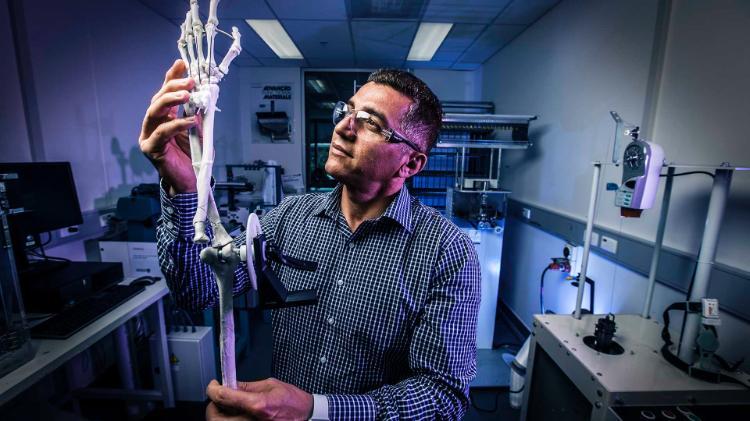 ARC-DECRA Fellow Dr Javad Foroughi demonstrates the artificial muscles.